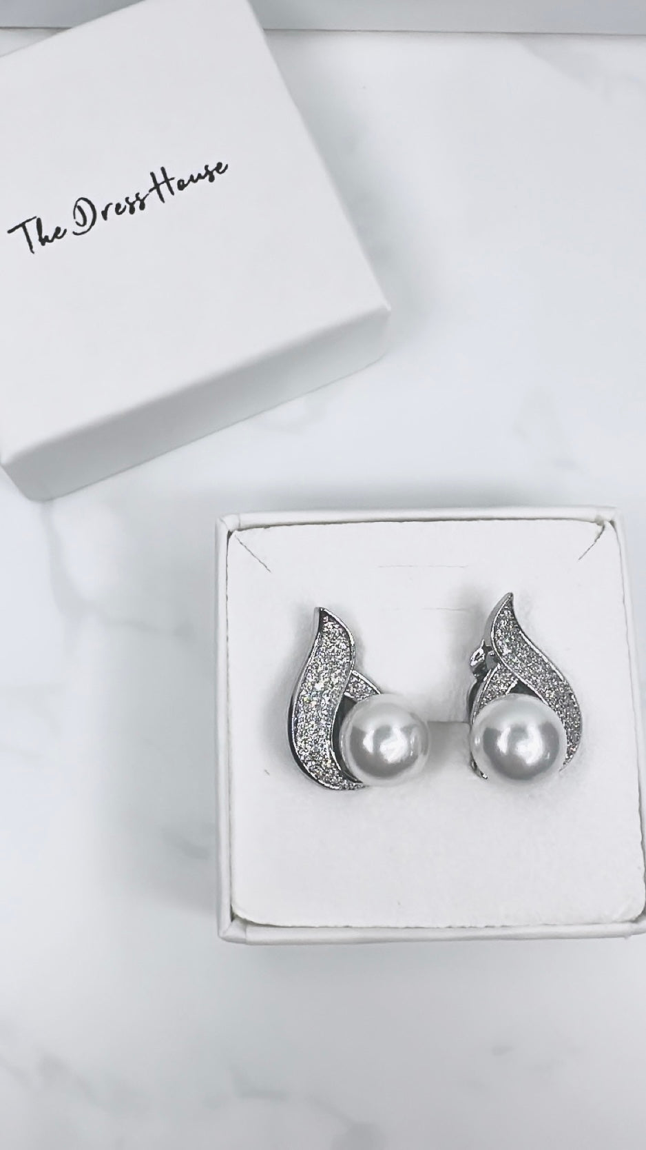 Charlotte silver clip on earrings 